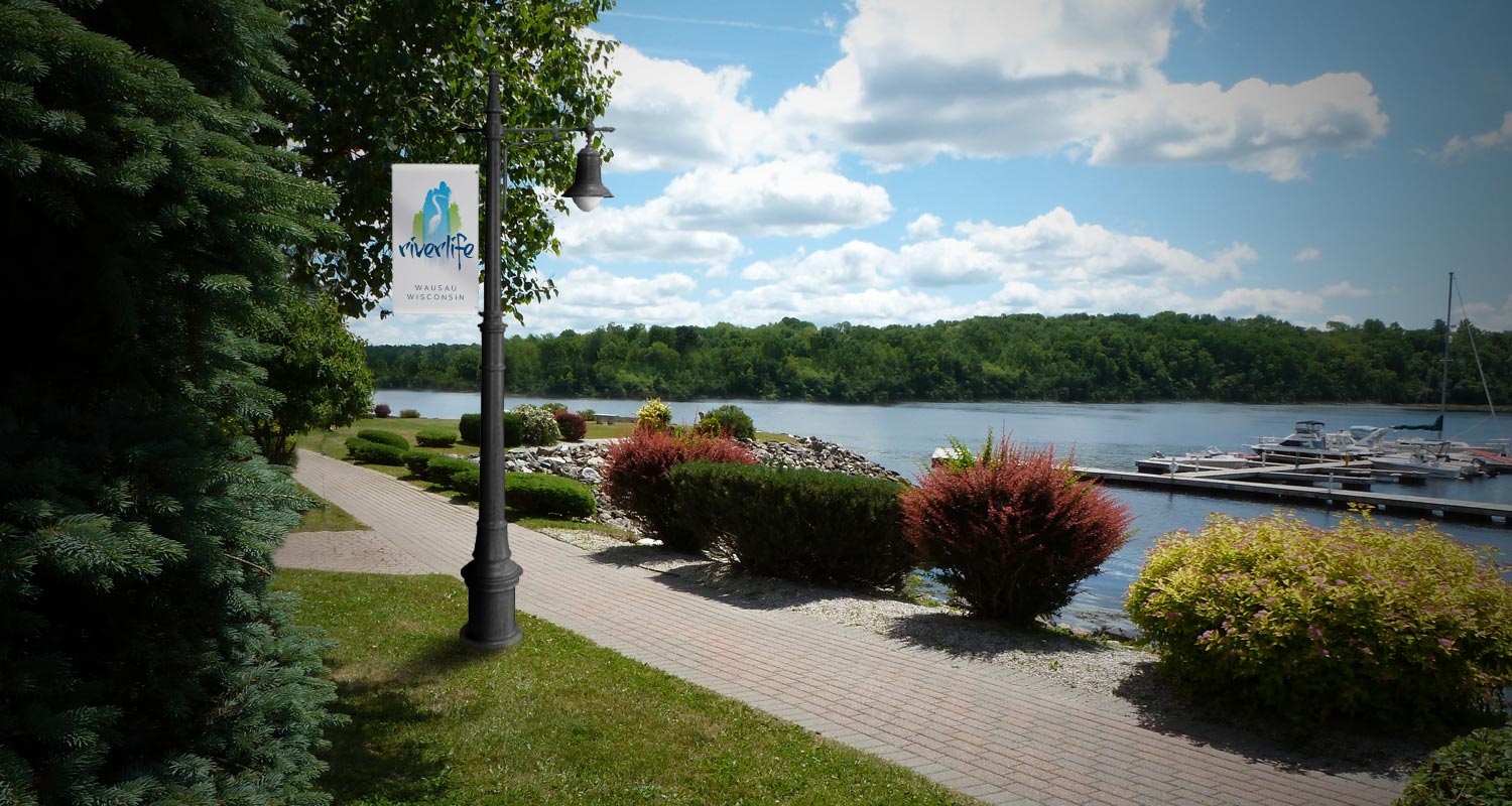 Wausau RiverLife logo and concept of outdoor signage